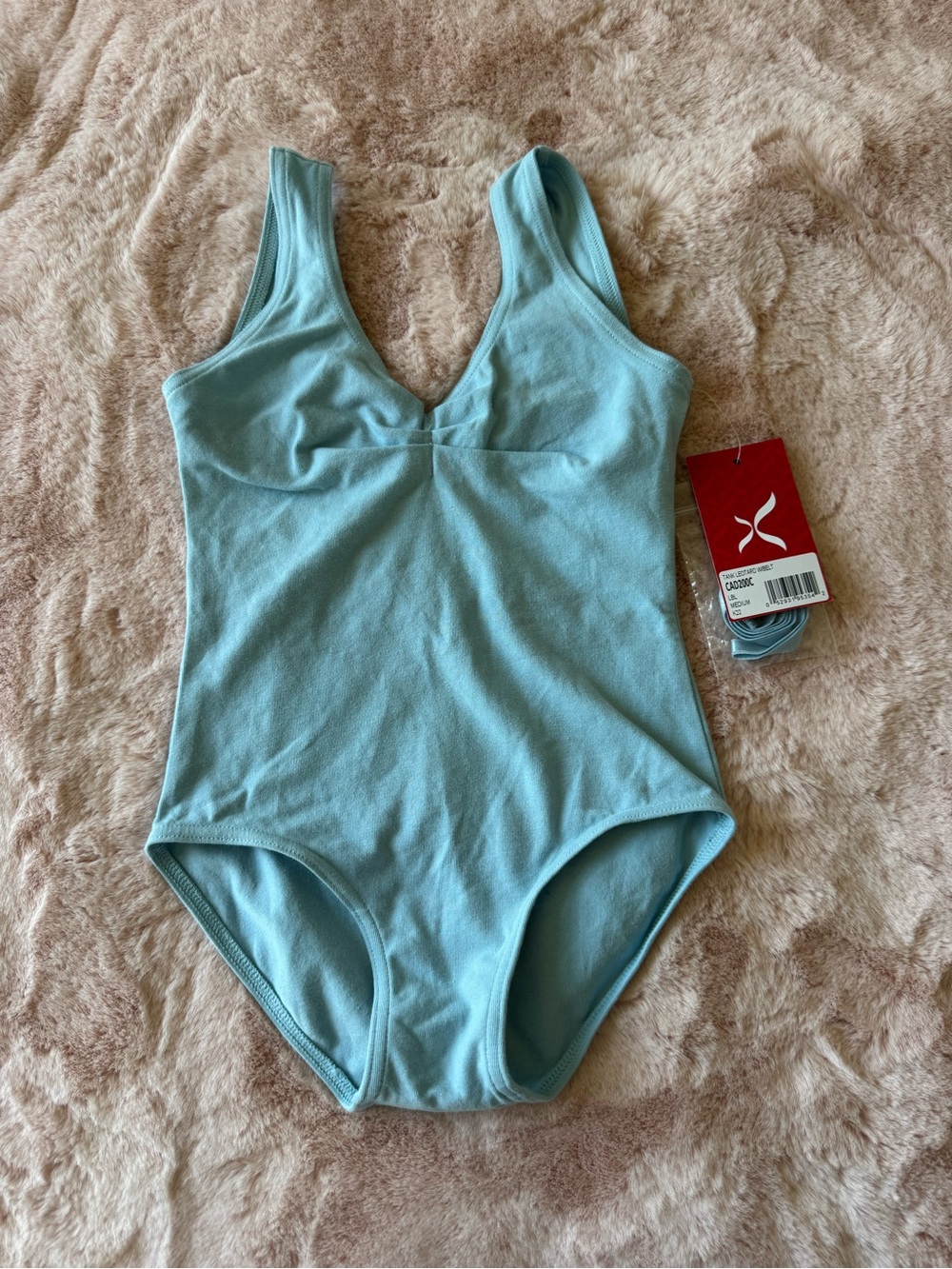 NWT is a Capezio Pinch Front Tank Leotard with Belt Blue Girls Size Medium